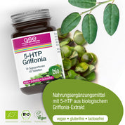 Eine Flasche 5-HTP Griffonia (Bio) von gse.organic.supplements ist neben Griffonia-Samen ausgestellt. Das bio-zertifizierte Etikett weist darauf hin, dass es vegan, glutenfrei und laktosefrei ist und 30 Portionen pro Flasche enthält.